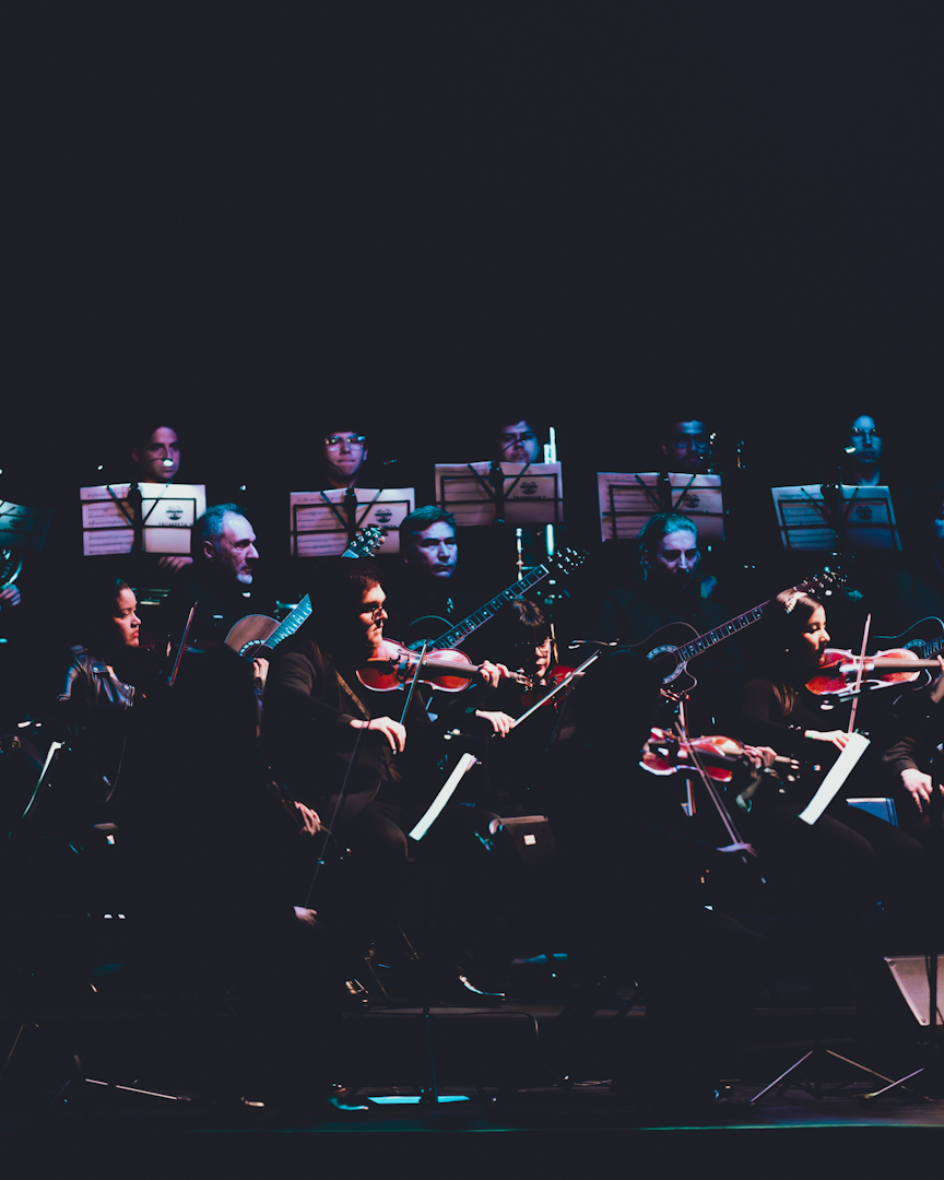 The League of Crafty Guitarists & Orquesta de Cámara de Santiago