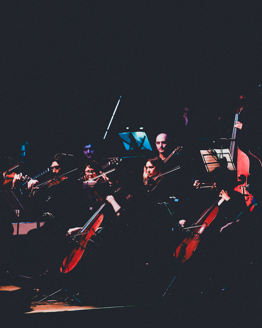 The League of Crafty Guitarists & Orquesta de Cámara de Santiago