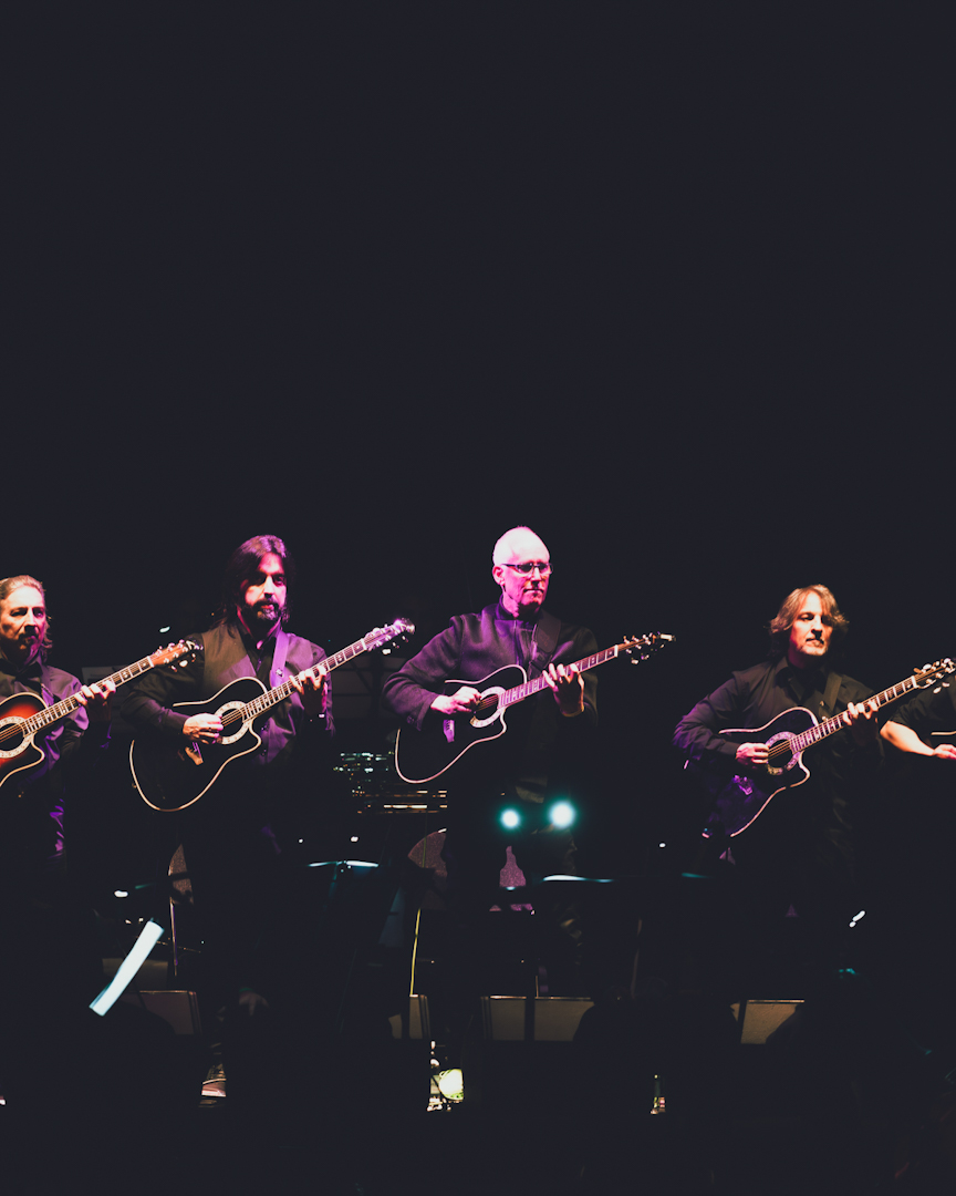 The League of Crafty Guitarists & Orquesta de Cámara de Santiago