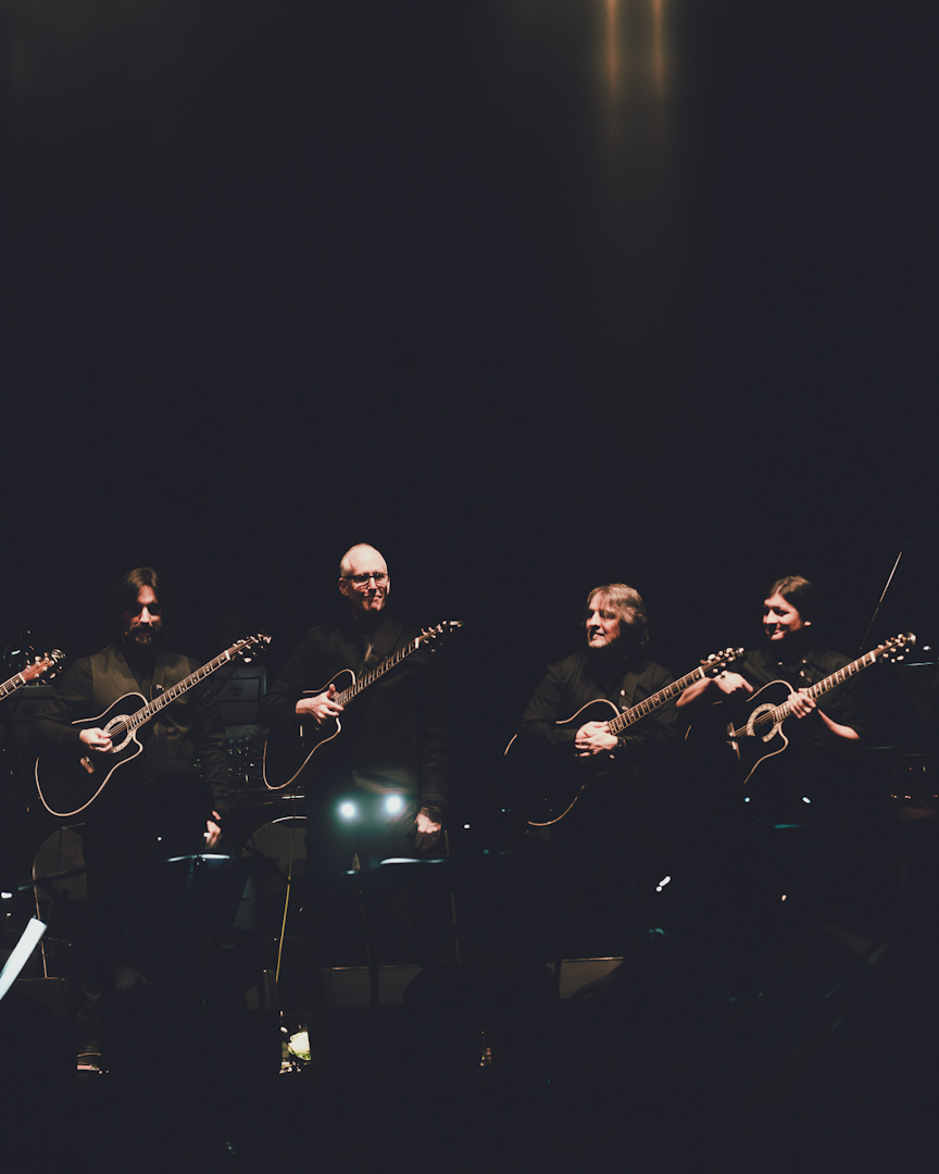 The League of Crafty Guitarists & Orquesta de Cámara de Santiago